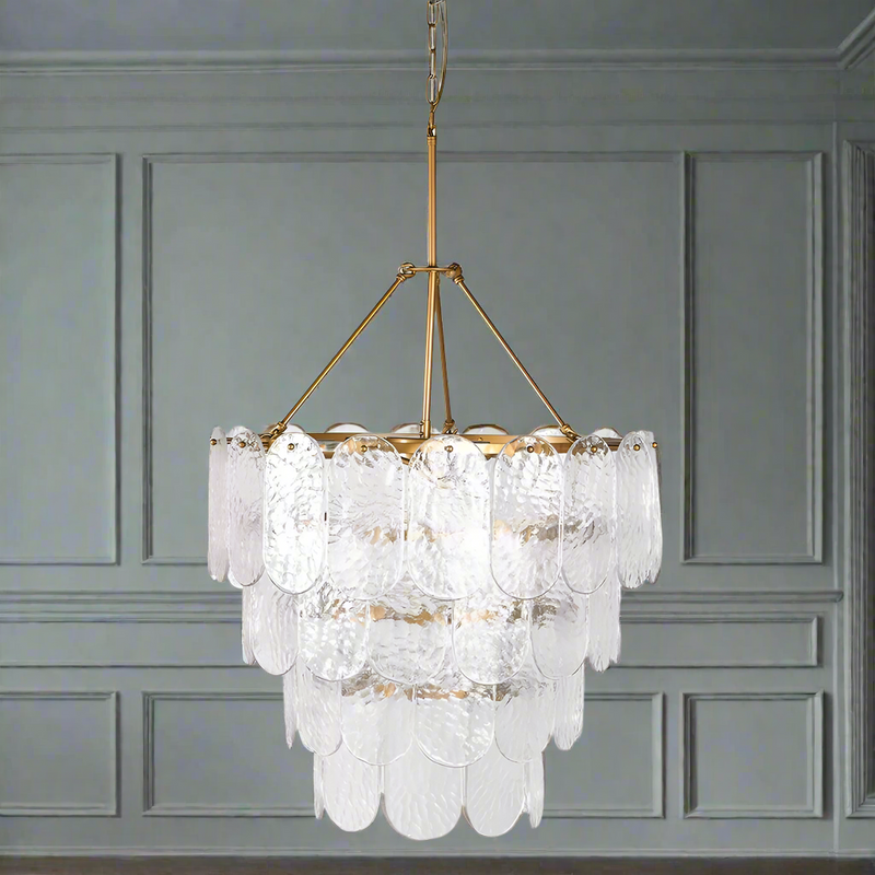 Stunning gilt metal chandelier with glass metal, petal shaped discs, on 4 layers. A pretty bedroom chandelier, giving a soft, muted light.


H: 104 cm (219 cm Maximum with Chain ) W: 66 cm