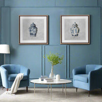 Set of two pale wood framed, blue and white Chinese Ginger Jar prints, great high-end finish on this particular pair of prints. Classic prints, perfect on a living room wall, the blue and white ginger jars are a classic accessory in an English country house residence and add a touch of classic luxury to a period or city home.&nbsp; A paritculary timeless subject, the paler wood frames contrast with the blue and white of the ginger jars.