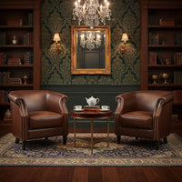 Luxurious leather armchairs in a lounge of a hotel