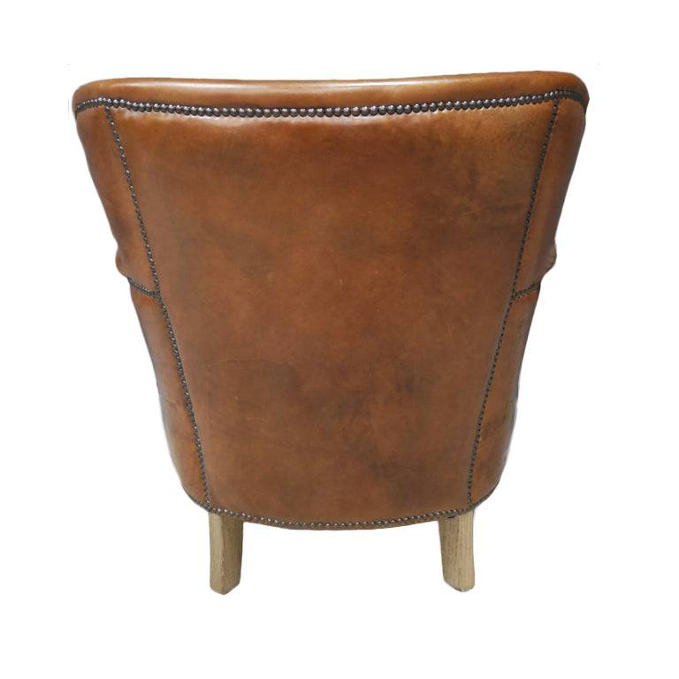 This is a classic leather armchair with a rich brown finish. The chair is upholstered in high-quality leather and has a slightly distressed finish.