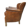 This is a classic leather armchair with a rich brown finish. The chair is upholstered in high-quality leather and has a slightly distressed finish.