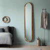 Tall, slim oval metal framed mirror with copper tinges. Perfect dressing room mirror, great at the end of narrow hall. This mirror is the perfect height for a dark narrow corner,