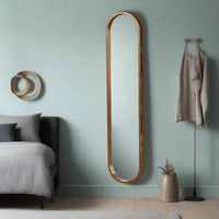 Tall, slim oval metal framed mirror with copper tinges. Perfect dressing room mirror, great at the end of narrow hall. This mirror is the perfect height for a dark narrow corner,