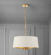 Brass Pendant Light with Cream Shade, adjustable, can be lifted to any required height. Gives out a great muted light, perfect in a bedroom and so chic in a living room.