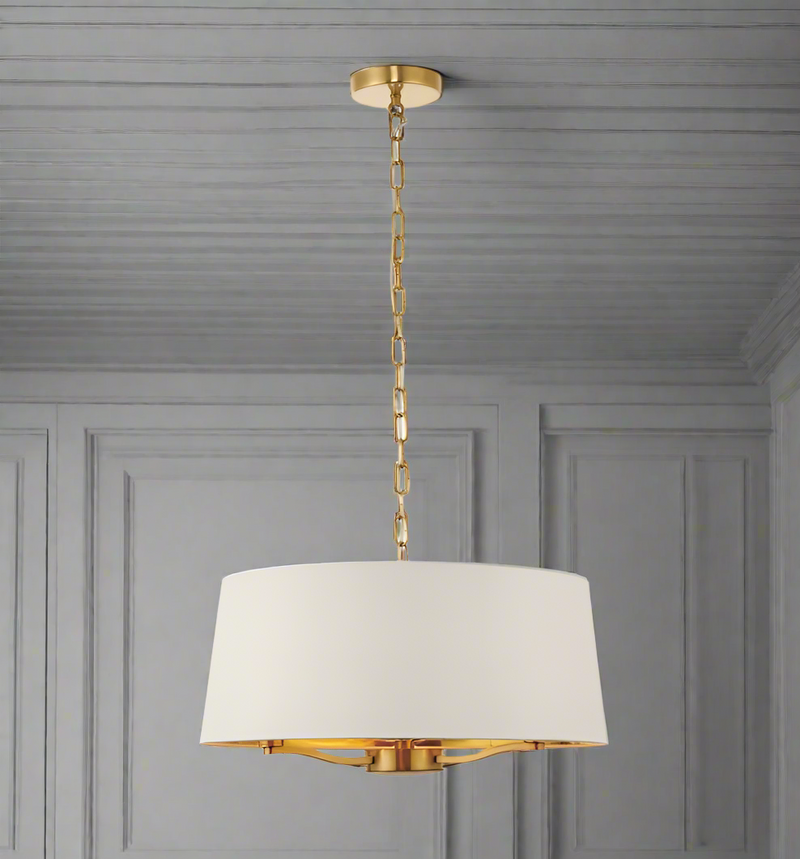Brass Pendant Light with Cream Shade, adjustable, can be lifted to any required height. Gives out a great muted light, perfect in a bedroom and so chic in a living room.
