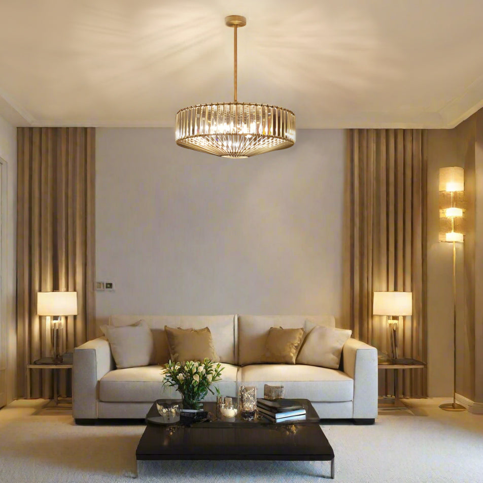 An elegant crystal and bronze chandelier with adjustable height. Its warm glow and geometric design elevate dining rooms, living rooms or hallways