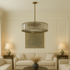 An elegant crystal and bronze chandelier with adjustable height. Its warm glow and geometric design elevate dining rooms, living rooms or hallways