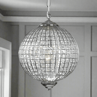 Chrome Globe Chandelier available in two sizes 50cm or 40cm wide. Crystal beading encased in silver metalwork reflects a pretty pattern around your ceiling and walls.