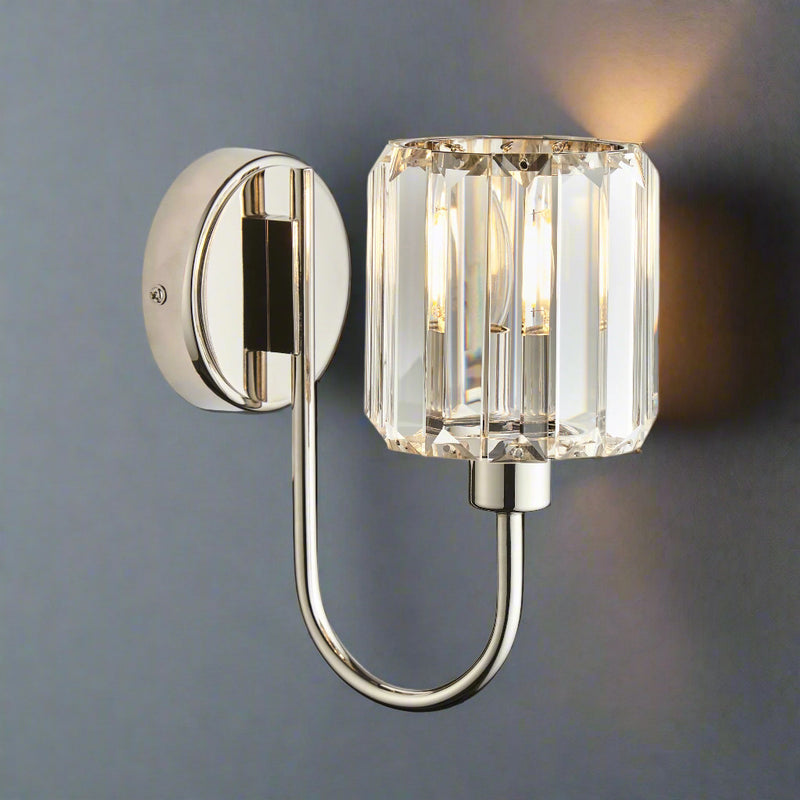 Curved nickel wall light with faceted glass prisms. A great match for our Crystal Prism chandeliers.