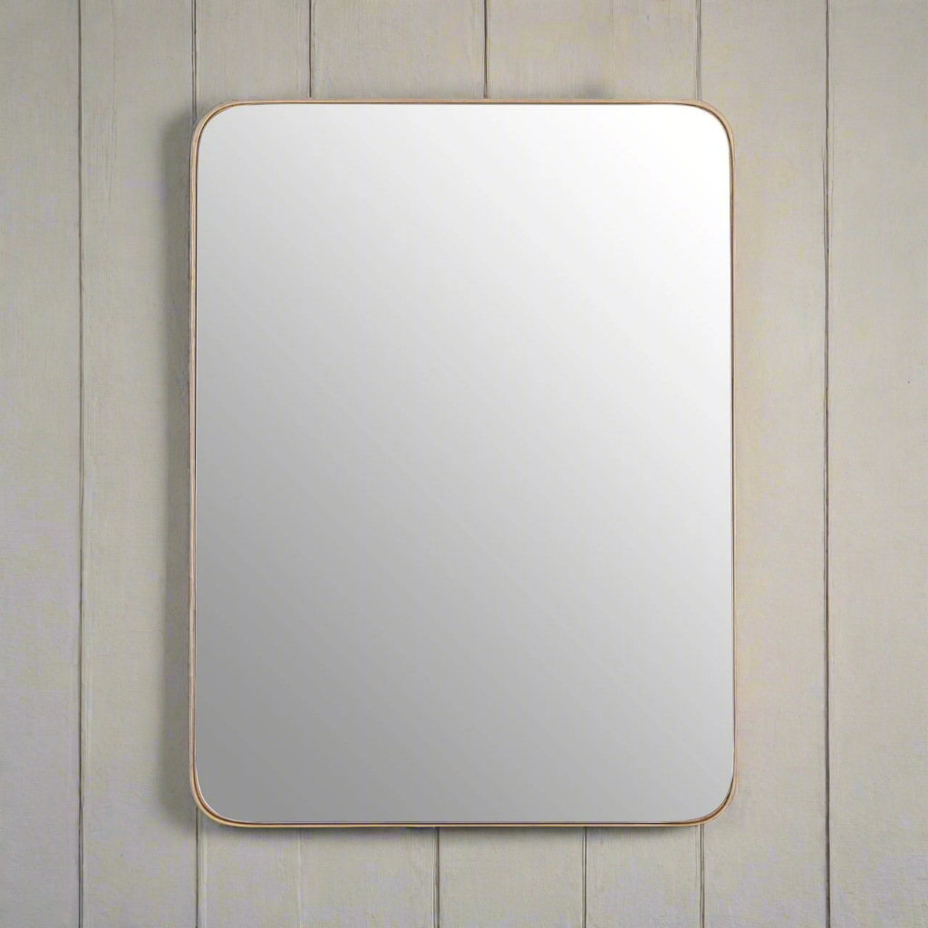 Curved edge gilt mirror with a slim profile frame, offering a lot of glass for extra light in any room, simple and very effective mirror. Great bathroom, bedroom or dressing room mirror