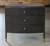 This stylish chest of drawers features a dark grey finish with great wood texture for a unique look. It is complemented by elegant brass handles and brushed gold feet.

It has three deep drawers with plenty of storage. The classic design pairs beautifully with modern and traditional decor, making it perfect for any interior design style adding a touch of luxury to any room.