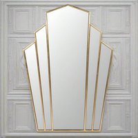 Art Deco mirror with gilt metal edges and fan-shaped sectional glass design, perfect for wall mounting. Adds vintage glamour and depth to home decor.