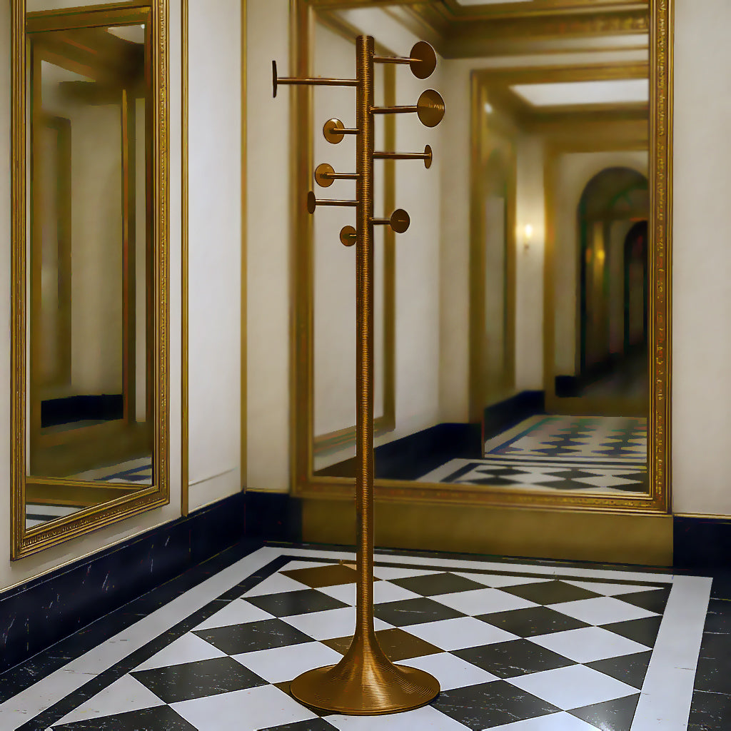 Modern aged brass coat rack with geometric design in a contemporary hallway setting