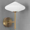 This very attractive wall light matches our White Glass and Gilt Metal Pendant.&nbsp; It would work beautifully independent of the ceiling light.&nbsp; It has the diamond shaped opaque glass globe on top of&nbsp; a brushed gilt metal stand.&nbsp; &nbsp;Standing 25 cm high and 20 cm in width, this is a compact, perfectly formed wall light which will unobtrusively brighten any wall.&nbsp; A stunning contemporary design, it will work in the most modern of interiors.

This light is IP20 rated and&nbsp; requires
