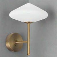 This very attractive wall light matches our White Glass and Gilt Metal Pendant.&nbsp; It would work beautifully independent of the ceiling light.&nbsp; It has the diamond shaped opaque glass globe on top of&nbsp; a brushed gilt metal stand.&nbsp; &nbsp;Standing 25 cm high and 20 cm in width, this is a compact, perfectly formed wall light which will unobtrusively brighten any wall.&nbsp; A stunning contemporary design, it will work in the most modern of interiors.

This light is IP20 rated and&nbsp; requires