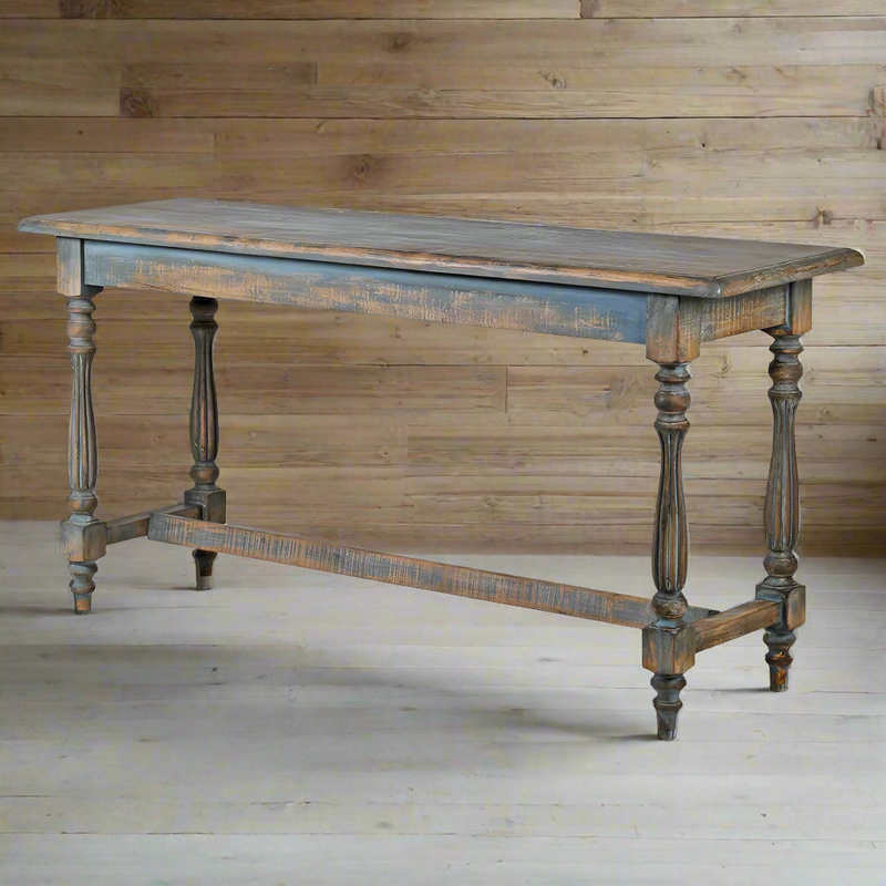 Long,, distressed blue painted console, with stunning turned wooden legs this is a perfect Country House piece.&nbsp; It would look just as good in an urban setting adding character with its originality and colour.