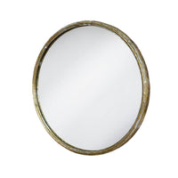 A round wall mirror with a distressed gold metal frame. The textured frame gives a vintage and rustic feel. The mirror itself is smooth and clear, providing a clean reflection. The combination of the aged gold finish and the simple, round shape creates a timeless, elegant look, making it suitable for various interior designs, from contemporary to more traditional spaces. This mirror suits any room and will add light, from every direction to any room.