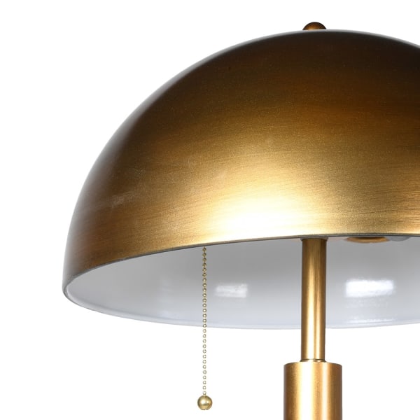 Detail of the gold dome of the floor lamp