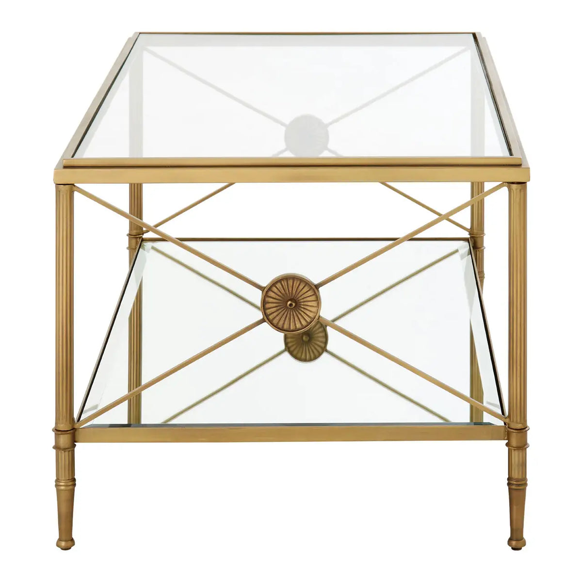 Empire style gilt metal and glass coffee table with metal cross medallion ends. This classic table will work well in a traditional or ultra contemporary setting. The mixture of the gilt metal and glass makes for a beautiful light and airy yet substantial piece of furniture.