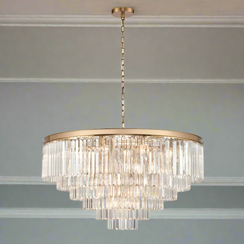 Extra large gold banded, 5 tiered prism chandelier with 27 lights. Absolutely stunning statement chandelier, the gleam of the gilt band and the crisp light of the crystal are opulent in the extreme.

W: 80 cm H: 74 (Min) 253 (Max)