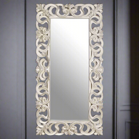 Extra tall, highly decorative silver mirror. A statement in a subtle rubbed silver finish with ornate pierced frame. &nbsp; The unusual fretwork on this massive mirror is impressive and luxurious. A geat leaner mirror for your dressing room, bedroom in fact any living space. 