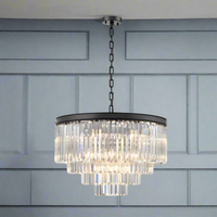 Extra large four tier crystal prism chandelier, beautiful crystal fixture and the black band gives it a contemporary feel. Great over a dining table, would work well in an open kitchen diner.


W: 65 cm Min Drop: 67 cm&nbsp; Max Drop: 245 cm