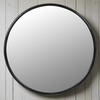 Extra large circular black framed mirror, a great industrial mirror, in a contemporary kitchen or living room to add light and exaggerate the space - ideal.


W: 109 cm