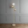 Three brass disc lights shine out from this gilt metal floor lamp. An unusual design to give you directional light in your study, bedroom, any room needing that extra light.