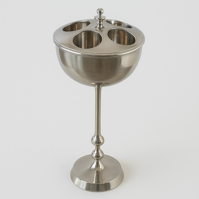 This elegant floor-standing wine cooler holds up to four bottles, keeping your favourite wines perfectly chilled and within easy reach. Crafted from durable nickel with a sleek polished finish, it features a stable pedestal base and removable top for easy serving. Ideal for home bars, dining rooms, or entertaining spaces, this 4-bottle wine cooler combines functionality with timeless style - a perfect addition for any wine enthusiast. A luxurious accessory for your dining table.