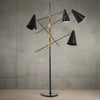 A stunning contemporary floor lamp with four black adjustable, directional lampshades coming from a tall black lamp frame on a marble base.&nbsp; &nbsp;The shades are attached to the frame with a gilt adjustable screw.&nbsp; &nbsp;Contemporary floor lamp with an industrial twist.&nbsp; The directional shades can be used to light up every area of the room, stood by the side of a favourite chair for reading.&nbsp;&nbsp;