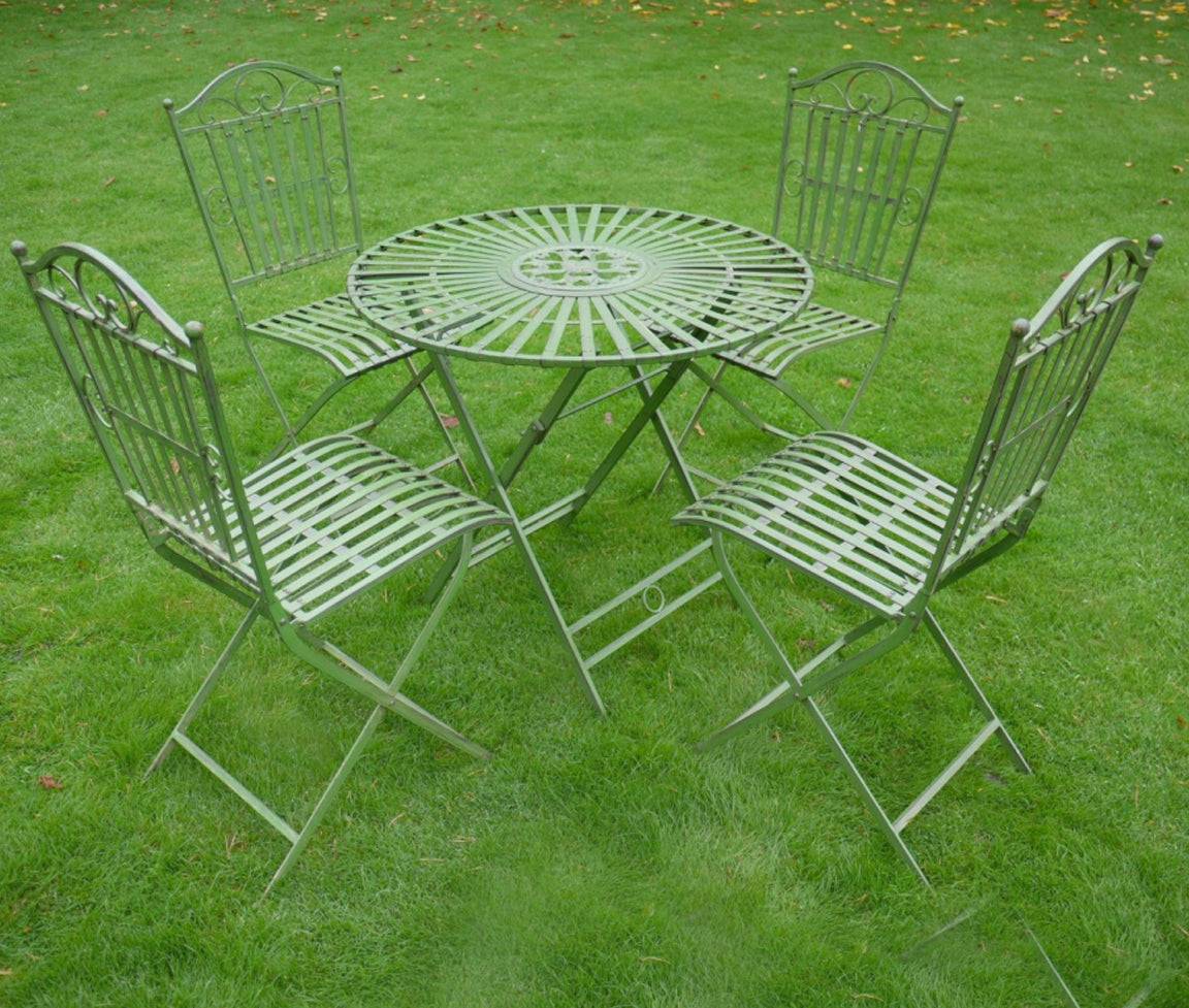 Foldable five piece garden bistro set in a light green. With an antique and vintage aesthetic this set would be a focal point in a garden, patio, or balcony. It adds visual interest and creates a charming spot to enjoy the outdoors. The unique look of this garden set will create a charming and functional outdoor space to enjoy al fresco dining.