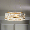 Gilt encased crystal chandelier in a 'halo' shape, large enough to make a great impression in any room on three metal chains so that you can change the height to suit your space. Unusual concave faceted crystal drops.
