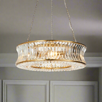 Gilt encased crystal chandelier in a 'halo' shape, large enough to make a great impression in any room on three metal chains so that you can change the height to suit your space. Unusual concave faceted crystal drops.
