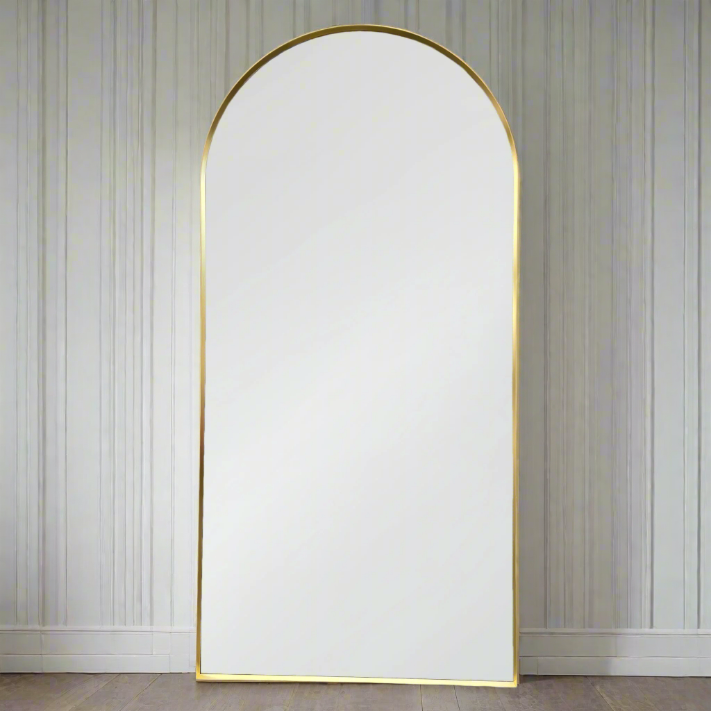 Metal framed arched mirror with a slim, profile frame. A contemporary gold framed mirror with a great contemporary feel. Tall dressing style mirror, perfect in a bedroo or dressing room. Ideal size for a living room or hall.&nbsp;