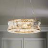 Gilt encased crystal chandelier in a 'halo' shape, large enough to make a great impression in any room on three metal chains&nbsp; so that you can change the height to suit your space. Unusual concave faceted crystal drops.


W: 61 cm H: 59 cm (Min)&nbsp; 166 (max)