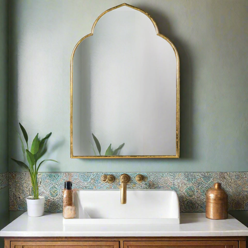 Exceptionally pretty ,teardrop sectioned mirror with candle sconces, tall enough to make a real statement.&nbsp; The pierced metal adding a Moroccan feel to this unusual mirror.&nbsp; A little work of art which can be lit with tealights for a dramatic effect.


H: 88 cm W: 47 cm D: 12 cm