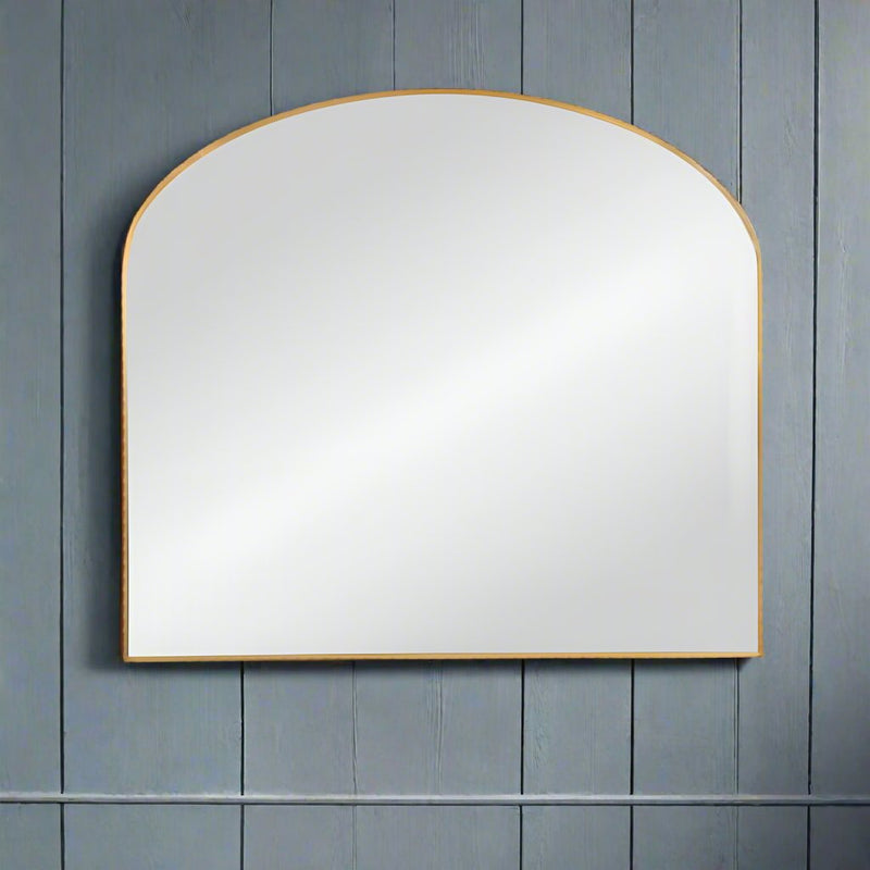 A slim, gilt framed overmantle style mirror, a clean, contemporary design which would look great over a fireplace in any room. Perfect over the most modern fireplace.