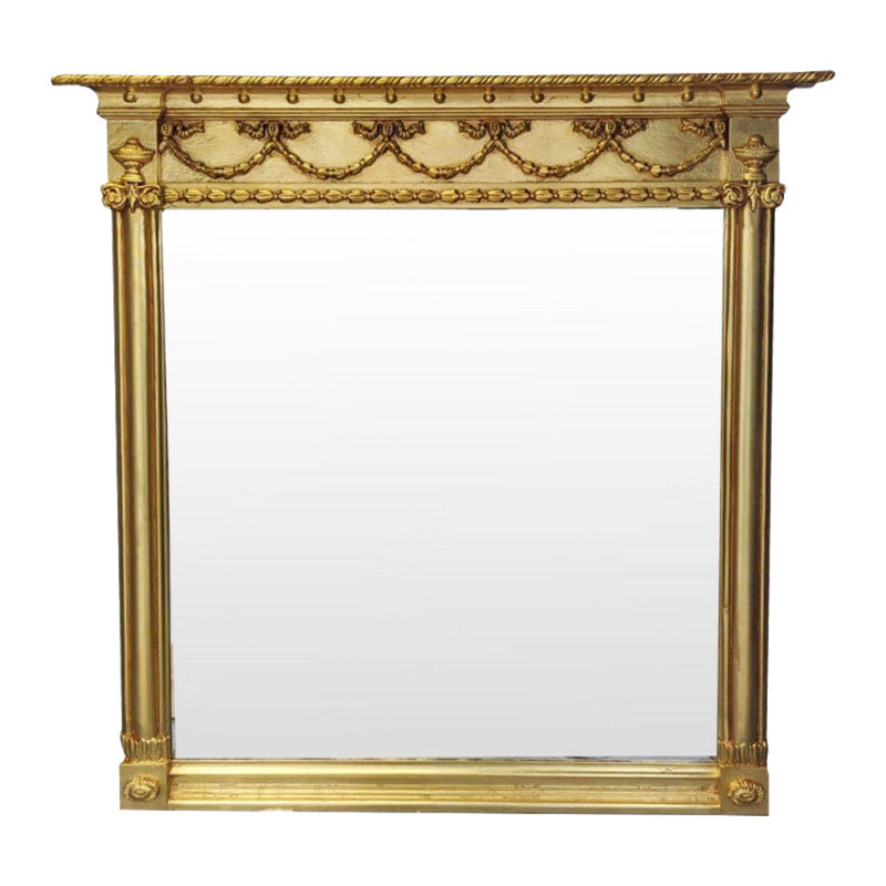 Period style giltwood overmantle mirror, perfect in a Victorian or Edwardian house.&nbsp; A stunning reproduction mirror in a pale gilt finish.&nbsp; The classic colour and style of this mirror has such a luxurious look, in a country house or over a marble fireplace in a city period home.