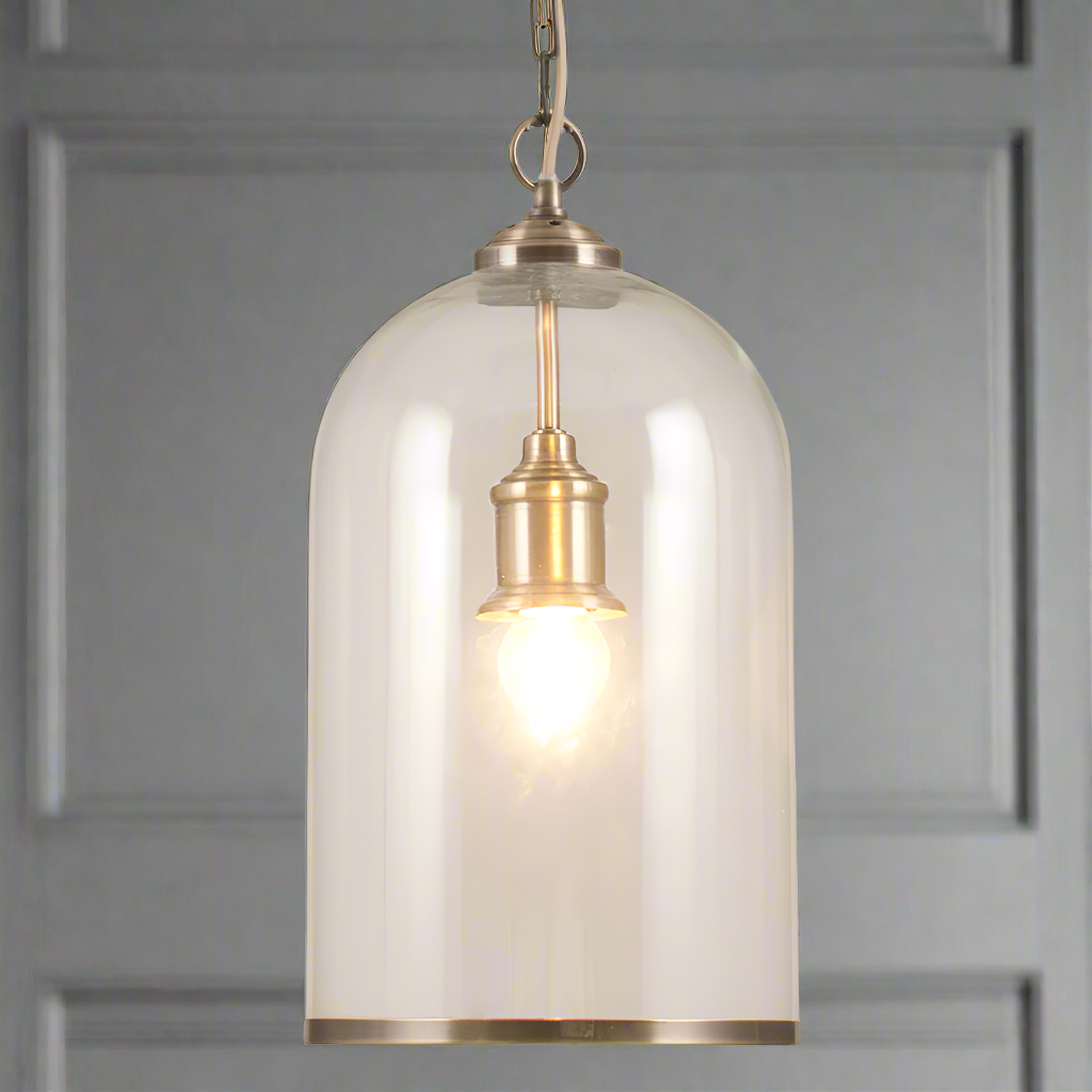 A great glass pendant with Brass or Nickel rim at the Base and same colour ceiling rose. Perfect hall light