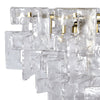 A statement chandelier made up of textured glass links resembling thick frosted crystal.&nbsp; &nbsp;The links are laid out in an overlapping layers, supported on a meal frame of antique gold providing a warm contrast to the cool, clear glass.&nbsp; Suspended on a chunky chain from a metal ceiling rose, the chandelier requires E14 bulb to give the radiant, ambient glow.&nbsp; Ideal for a foyer, living room or dining room .

H:&nbsp; 50 cm W: 75 cm&nbsp; D 75 cm&nbsp;