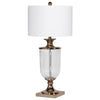Exceptionally beautiful glass urn shaped lamp with antique brass meytal mounts and white fabric shade. A classic, timeless style.