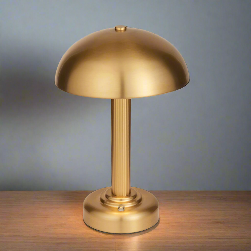 Brushed gold, dome topped rechargeable mini lamp with a USB port. These lamps are so convenient, can be placed wherever needed, no wires or plugs. 