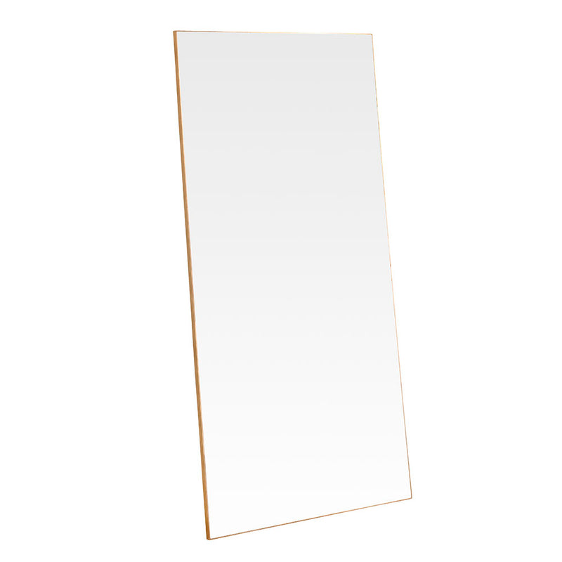 A simple and highly effective mirror minimalist in design yet maximum in impact.&nbsp; With a super slim wooden gold frame that is 2cm in depth, the striking thing about this mirror is the sheer volume of glass that reflects and bounces light back into your room.&nbsp; Made in the UK, this mirror is worth the wait.&nbsp; Also available in black.   H: 180 cm W: 90 cm D: 2 cm  Weight: 26 kg