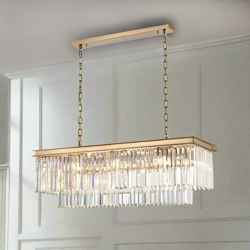 Exceptionally stunning rectangular crystal prism chandelier. The warmth of the gold metal with the crystal prism drops - total luxury. Perfect over a dining table, totally luxurious. 