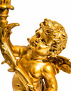 Gold cherub table light, perfectly formed cherubim hand outstretched holding a lamp.&nbsp; The lamp looks best with the addition of a filament bulb to add a glow.&nbsp; The lamp has a rococo decorative style working well in a luxurious bedroom, baroque styled living room - anywhere you need a touch of glamour.&nbsp; &nbsp;So decorative but also perfectly functional.&nbsp;