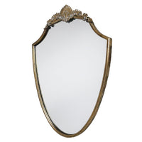 Exceptional oval mirror, ornate with a carved frame and flourishes to the top and base, great vintage looking mirror in brass. A classic shape perfect for a period home.