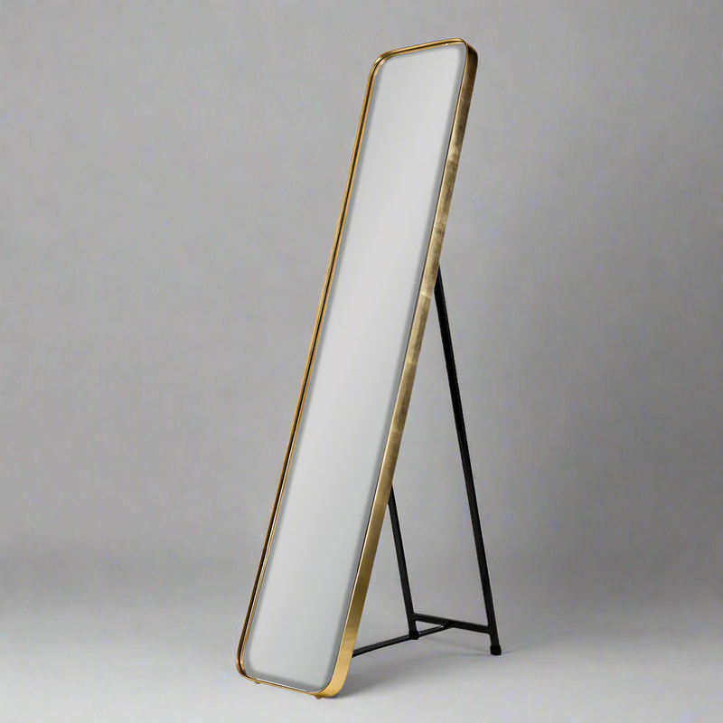 Slim, tall dressing mirror. Has a stand for use as dressing mirror or can be wall hung. This slimline mirror is perfect for even the smallest bedroom, it can be leant and then pulled out on the stand to check your appearance.