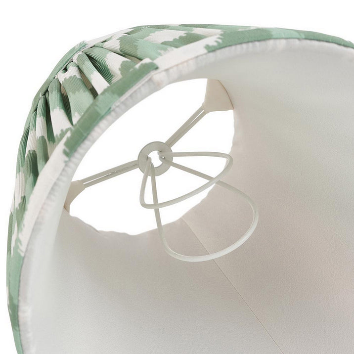 16cm tapered shade with a clip to fit golf or candle bulbs. Unique chevron pattern design in green with taped edge detailing.
Perfect when paired with decorative table lights, wall lights or chandeliers.