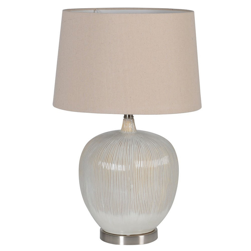 Such a great lamp, the shade perfectly matching the colour of the ceramic base. This lamp is really about textures, the linen shade and the ceramic base - perfect.