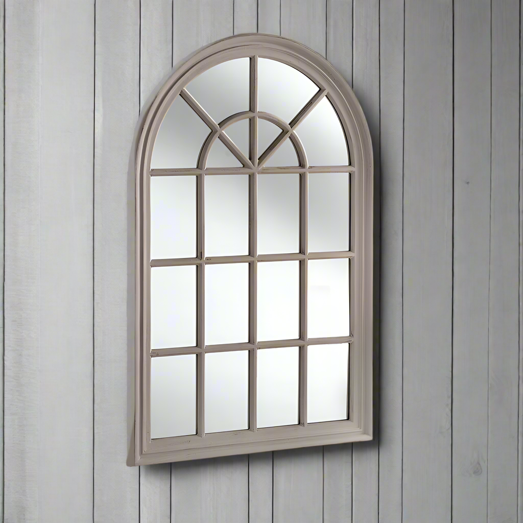 Distressed soft black finished, wooden, arched window mirror. These window mirrors work really well in a patio setting, flashing light into the darkest of areas